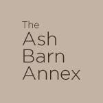 The Ash Barn Annex with hotel parking logo