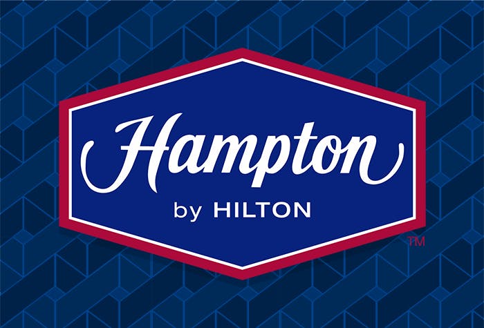 Hampton by Hilton with hotel parking logo