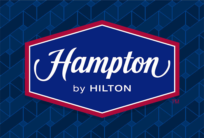 Hampton by Hilton with breakfast and secured parking logo
