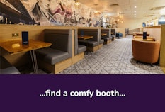 NCL Aspire Lounge booth